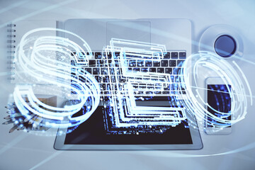 Double exposure of SEO drawing over study table background with computer. Concept of search. Top view.