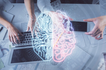 Double exposure of man and woman working together and human brain hologram drawing. Brainstorm concept. Computer background. Top View.