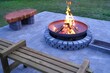 Iron fire pit and burning fire in fire place  a garden .