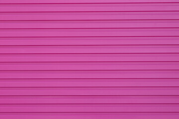 Wall Mural - pink steel shutter wall background and texture.