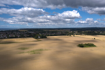 Aerial View over Goring Gap farmland with Ferring village and Goring by Sea on a beautiful summers day in Southern England.