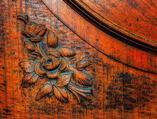 Vintage floral decoration carved in wood.