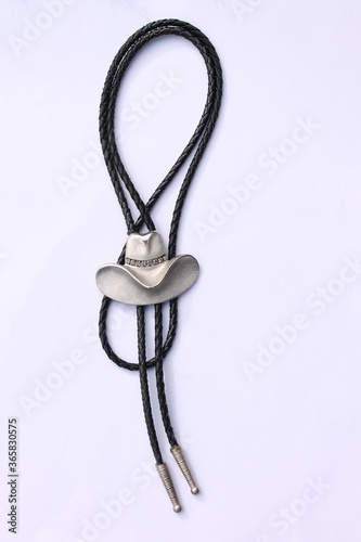 Cowboy leather bolo tie with a silver Stetson