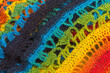 handmade multicolor crochet background with double crochet stitches, triple crochet stitches and chain stiches