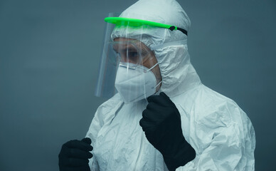 Vaccine, Covid19, Nurse with protective face mask, glasses and sanitary mask. coronavirus and treatment concept on gray and neutral background