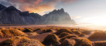 Vestrahorn Mountaine On Stokksnes Cape In Iceland During Sunset. Amazing Iceland Nature Seascape. Popular Tourist Attraction. Best Famouse Travel Locations. Scenic Image Of Iceland