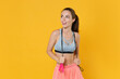 © ViDi Studio - Funny young fitness sporty woman girl in sportswear working out isolated on yellow background studio. Workout sport motivation lifestyle concept. Mock up copy space. Hold skipping rope, looking aside.