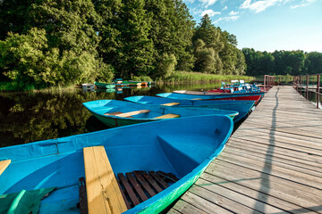 Wall Mural - Wooden rowboats at the pier.