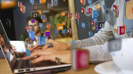 Poster - Digital icons against woman using laptop