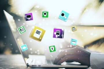 Poster - Hands using laptop with glowing social media icons.