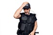 © Krakenimages.com - Middle age policeman wearing police uniform and bulletproof vest over white background surprised with hand on head for mistake, remember error. Forgot, bad memory concept.