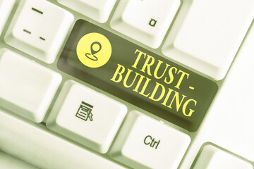 Poster - writing note showing trust building. business concept for developing trust in so they can function e