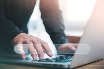 Leinwandbilder - Data Search Technology Search Engine Optimization. man's hands are using a computer notebook to Searching for information.Using Search Console with your website.
