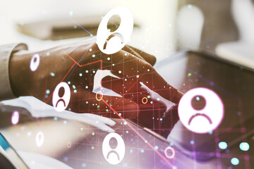 Poster - Double exposure of social network icons concept and hand working with a digital tablet on background. Networking concept