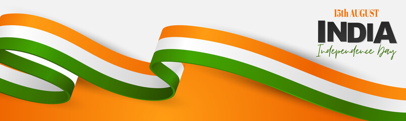 Wall Mural - India Independence Day. Indian national August 15th holiday celebration header or long banner with orange, white, and green flag ribbon. Vector illustration.