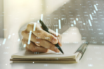 Poster - Multi exposure of stats data illustration with man hand writing in notebook on background, computing and analytics concept