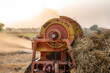 wheat harvest with thresher in rural Punjab ,  agricultural fields of  crops of Pakistan 