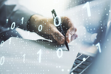 Leinwandbilder - Double exposure of creative abstract binary code hologram and hand writing in notebook on background with laptop. Database and programming concept
