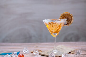 Wall Mural - cocktails on wooden table background and space for text 