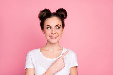 Wall Mural - Close-up portrait of her she nice-looking attractive lovely charming pretty cute cheerful cheery girl demonstrating copy space ad decision isolated over pink pastel color background