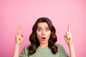 Sticker - Portrait of astonished girl point index finger copyspace indicate wonderful adverts promotion impressed scream wow omg wear good look jumper isolated over pastel color background