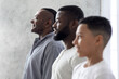 © Prostock-studio - Multigenerational Men Family Portrait. Black Son, Father And Grandfather Standing In Row