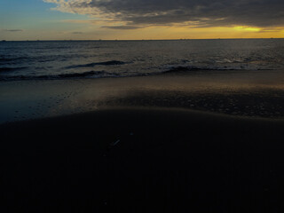 Wall Mural - beach with a sunset background