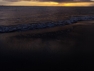 Wall Mural - beach with a sunset background