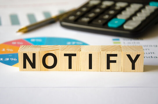  text notify written on a blue background near a magnifying glass and and a calculator