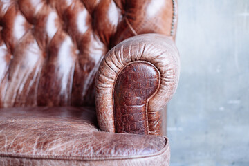 Wall Mural - Closeup texture of vintage brown leather sofa