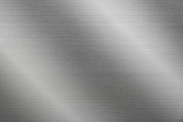 Poster - silver metal texture of brushed stainless steel plate with the reflection of light.