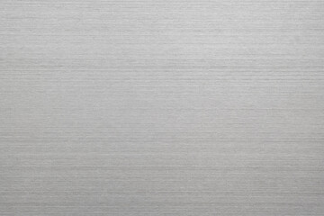 Poster - silver metal texture of brushed stainless steel plate with the reflection of light.