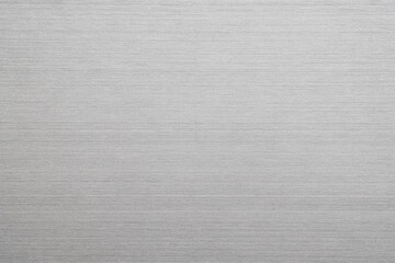 Poster - silver metal texture of brushed stainless steel plate with the reflection of light.