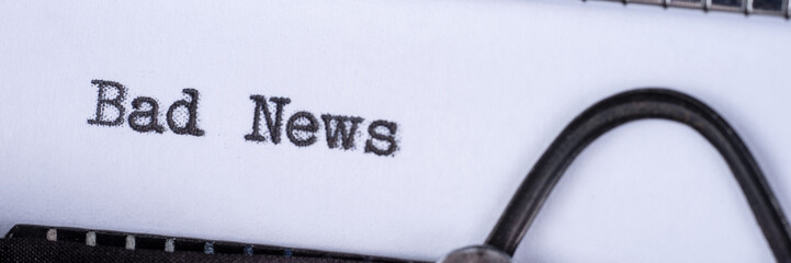 Fototapete - The text Bad News written on an old typewriter. Panoramic image