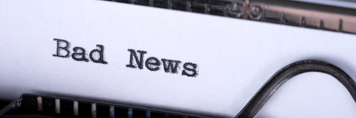 Fototapete - The text Bad News written on an old typewriter. Panoramic image