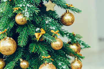 Wall Mural - Green fir tree with golden balls. Christmas wallpaper.