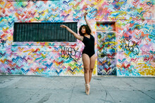 Mixed Race Ballet Dancer On Sidewalk