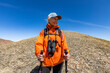 © Steve Smith/Tetra Images - USA, Idaho, Bellevue, Portrait of senior woman hiking in mountains