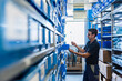 © Westend61 - Man in storage room of a factory
