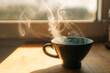 © Westend61 - Steam rising from freshly prepared coffee in cup on table at home