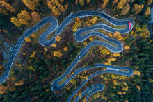 Aerial View Of Mountain Road Passing Through Forest
