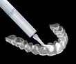 Teeth whitening kit, adding gel in to invisalign. 3D illustration concept.