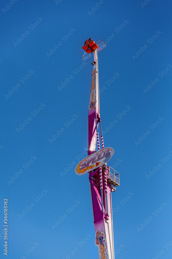 MACKAY, QUEENSLAND, AUSTRALIA - JUNE 2019: A fast thrill ride for older ...