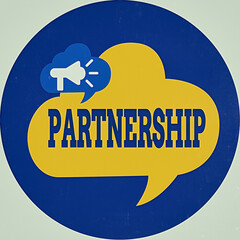 Poster - Writing note showing Partnership. Business concept for business type in which two or more individuals share ownership Megaphone in Speech Bubble Announcing Text Balloon Inside Circle