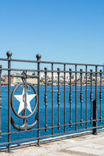 Close Up Of The Railing In Taranto On Blurred Industrial Site Called Ilva Background
