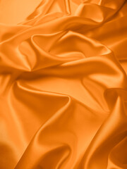 Wall Mural - Beautiful elegant wavy orange satin silk luxury cloth fabric texture, abstract background design. 