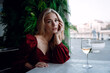 © Olena_Molchanova - woman with glass of white wine in cafe or restaurant. sexy young blonde girl
