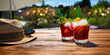 Sangria cocktail on summer evening
Fresh cold sangria cocktail on a summer evening. Still life with short depth of field on a terrace with fairy lights in background. Vacation and leisure lifestyle.