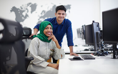 Canvas Print - Multiethnic startup business team with Arabian woman