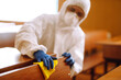 © maxbelchenko - Cleaning and disinfection school desk during coronavirus pandemic. COVID-19.